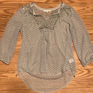 A slightly see-through, sparkly, long sleeve top!